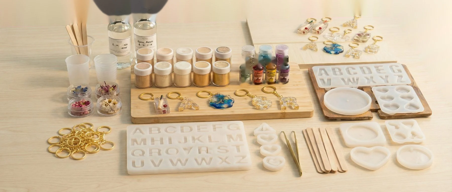 You and your wife working together in your studio. Show the real workspace. 600x480px