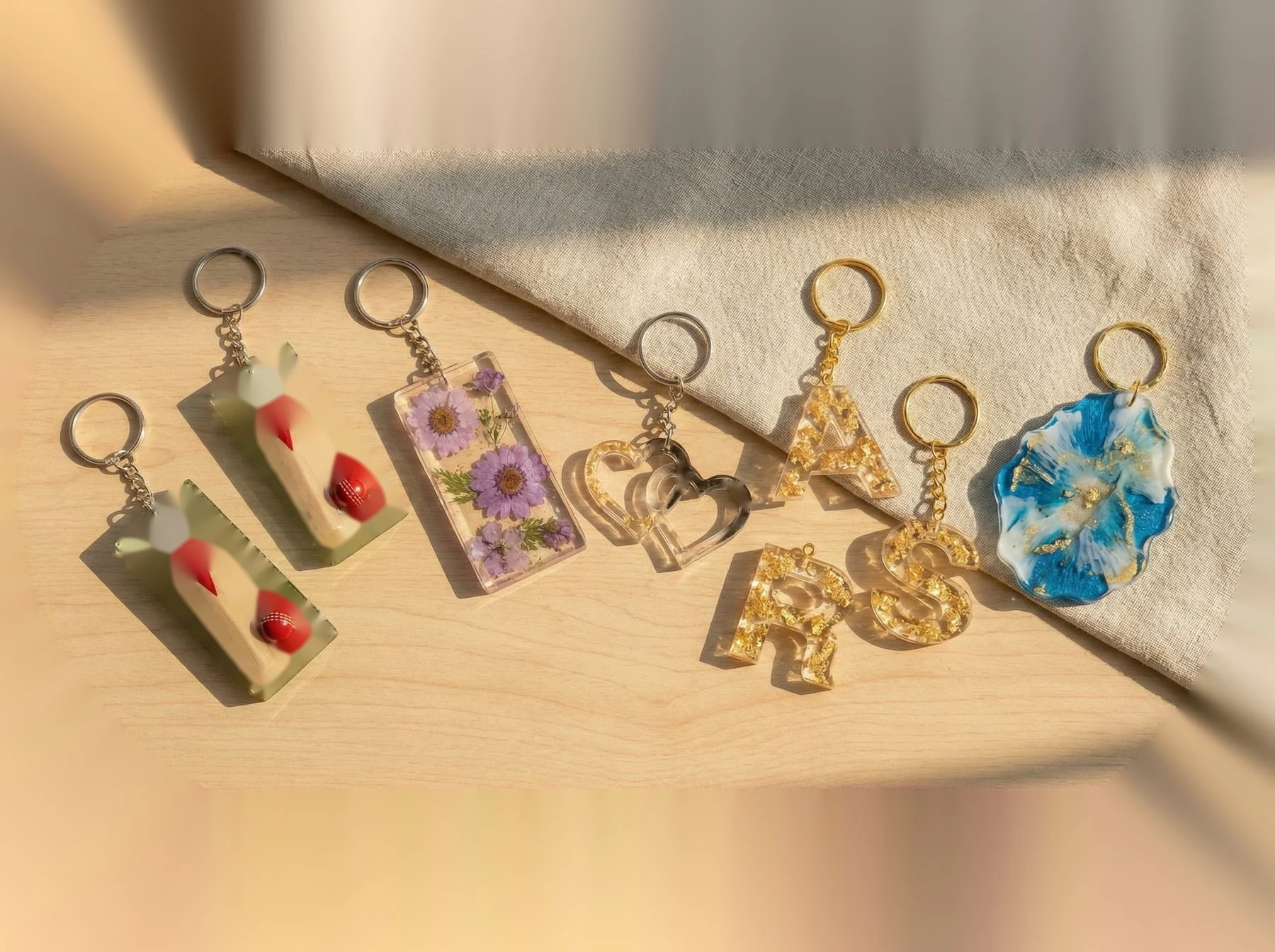 A tray or display of recently finished keychains ready for packaging. 400x280px